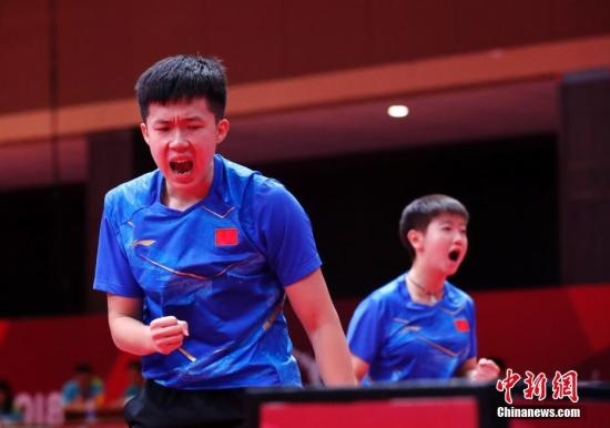 資料圖：雅加達(dá)亞運會，王楚欽/孫穎莎奪得混雙冠軍。 <a target='_blank' href='/'>中新社</a>記者 劉關(guān)關(guān) 攝