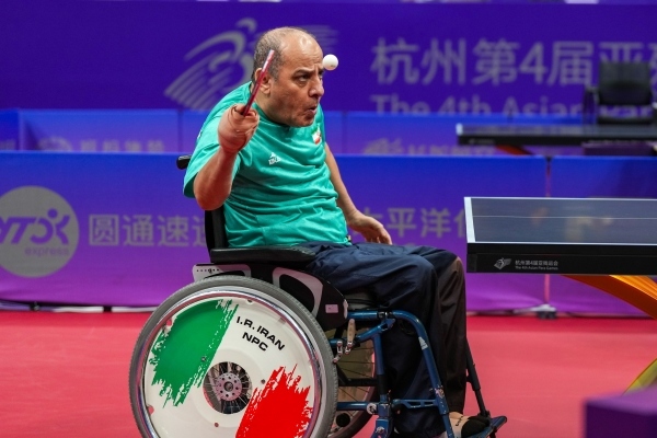 10月23日，杭州第4屆亞殘運會乒乓球男子單打Class2小組循環(huán)賽舉行。圖為伊朗隊選手哈?！ず嗁M尚在比賽中。圖片來源：杭州亞殘組委會